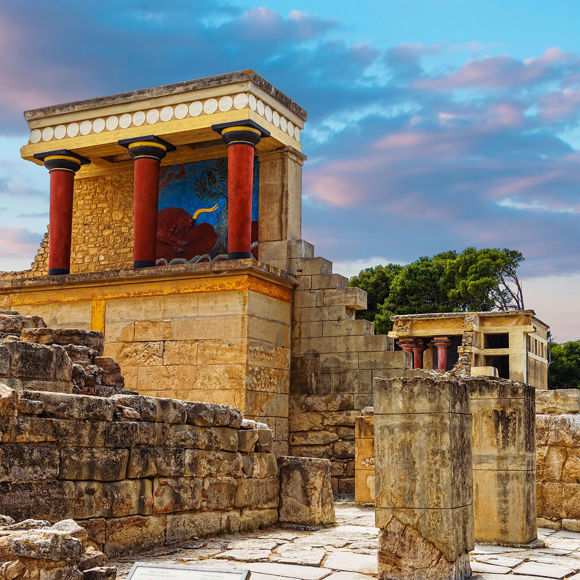 Ancient ruins of the Palace of Knossos in Heraklion, Crete with colorful frescoes and columns