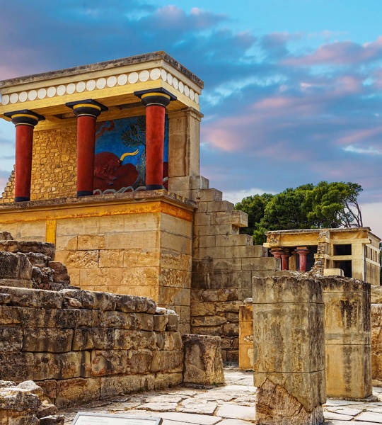 Ancient ruins of the Palace of Knossos in Heraklion, Crete with colorful frescoes and columns